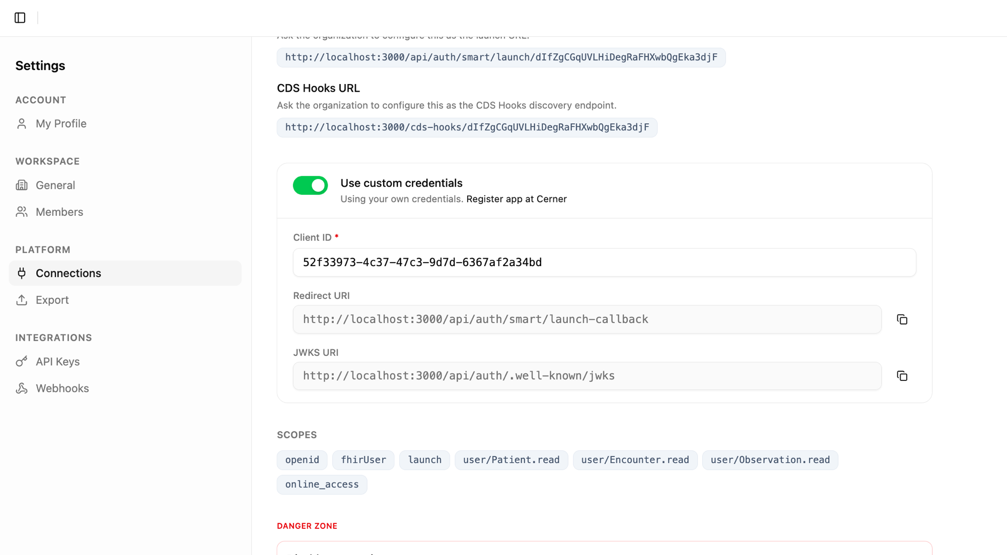 Medblocks Settings Connections Cerner detail — bottom of the page showing CDS Hooks URL, Use custom credentials toggle on, Client ID, Redirect URI, JWKS URI, and the resolved scopes openid fhirUser launch user/Patient.read user/Encounter.read user/Observation.read online_access